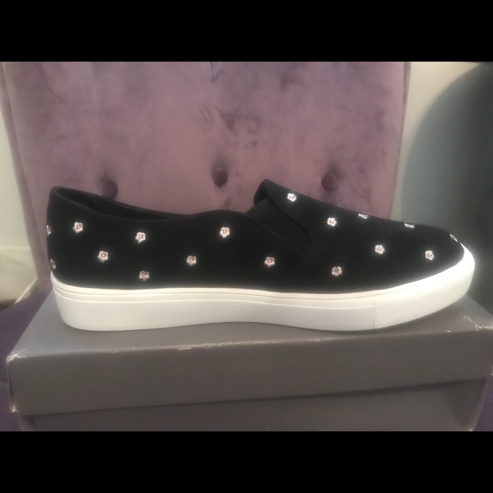 Black embroidered slip-on sneaker
